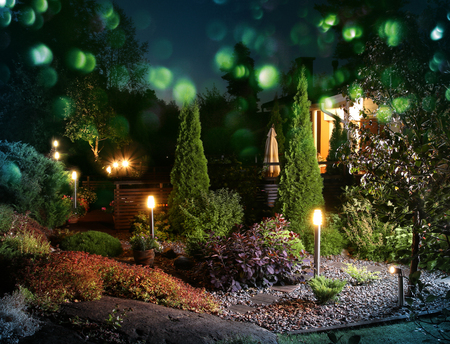Adding landscape lighting to your outdoor space will help create the perfect vibe for your next gathering.